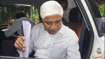 Former Delhi minister Rajendra Pal Gautam appears for questioning at Paharganj police station in New Delhi. (PTI)