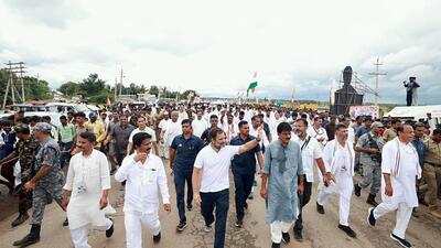 Chitradurga, Oct 11 (ANI): Congress leader Rahul Gandhi waves to the supporters during the party's Bharat Jodo Yatra, as Karnataka party chief DK Shivakumar and party leader KC Venugopal look on, at Harthikote, in Chitradurga on Tuesday. (ANI Photo) (ANI Picture Service) Chitradurga, Oct 11 (ANI): Congress leader Rahul Gandhi waves to the supporters during the party's Bharat Jodo Yatra, as Karnataka party chief DK Shivakumar and party leader KC Venugopal look on, at Harthikote, in Chitradurga on Tuesday. (ANI Photo) (ANI Picture Service)