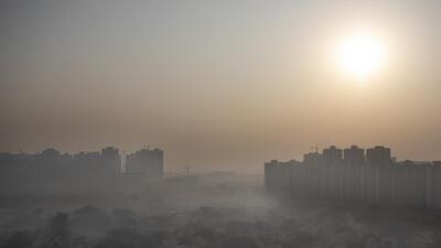 Morning haze envelops the skyline on the outskirts of New Delhi. (AP)