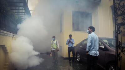 A municipal corporation worker fumigates an area in Greater Kailash 1 on a rainy day in New Delhi. (Raj K Raj/HT Photo) A municipal corporation worker fumigates an area in Greater Kailash 1 on a rainy day in New Delhi. (Raj K Raj/HT Photo)