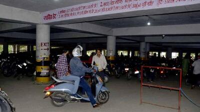 Two months after a new contractor was appointed at the multi-level parking lot in the District Administrative Complex, motorists continue to be taken for a ride, with the contractor charging double the sanctioned parking fee. (HT File) Two months after a new contractor was appointed at the multi-level parking lot in the District Administrative Complex, motorists continue to be taken for a ride, with the contractor charging double the sanctioned parking fee. (HT File)