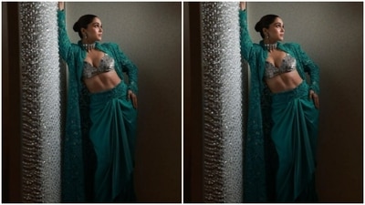 Sharvari looked sassy as ever in a silver leather bralette with a plunging neckline. She added more glam to her look with a green shrug with lace details throughout. In a green satin long skirt with ace details at the waist, she completed her look. (Instagram/@sharvari) Sharvari looked sassy as ever in a silver leather bralette with a plunging neckline. She added more glam to her look with a green shrug with lace details throughout. In a green satin long skirt with ace details at the waist, she completed her look. (Instagram/@sharvari)