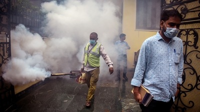 A South Delhi Municipal Corporation (SDMC) worker fumigates an area in Greater Kailash 1 on a rainy day in New Delhi. (Raj K Raj/ HT photo) A South Delhi Municipal Corporation (SDMC) worker fumigates an area in Greater Kailash 1 on a rainy day in New Delhi. (Raj K Raj/ HT photo)