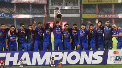 Indian players pose for photos with the trophy after winning the 3rd and final ODI cricket match of the series against South Africa (PTI)