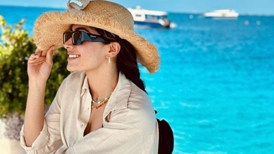 As Rashmika Mandanna shared solo pictures from Maldives, she quipped in the caption, “And posing has become part of my life but it is ok..if i should pose to look pretty for you all I don't mind!” As Rashmika Mandanna shared solo pictures from Maldives, she quipped in the caption, “And posing has become part of my life but it is ok..if i should pose to look pretty for you all I don't mind!”