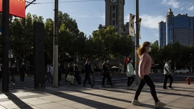 Covid In China: Pedestrians in Shanghai, China. (Bloomberg) Covid In China: Pedestrians in Shanghai, China. (Bloomberg)