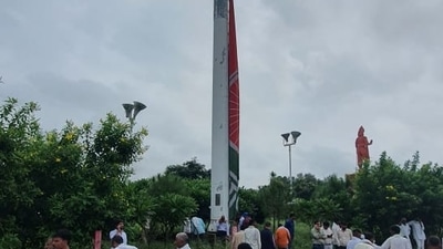 The kingsize Samajwadi Party flag that fluttered at a height of 60 ft in Saifai Mahotsava Pandal has been lowered for the first time. (HT Photo/Haidar Naqvi)