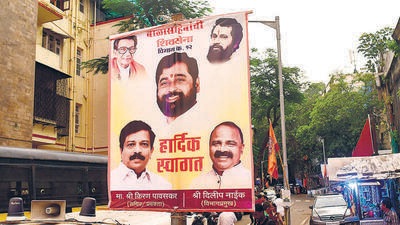 Mumbai, India - October 11, 2022: Supporters of CM Eknath Shinde put up a banner in the new party name “Balasahebanchi Shivsena” welcoming him for the Abhishekam in accordance with Shri Mahakal Lok Shivarpana program, at Babulnath temple, in Mumbai, India, on Tuesday, October 11, 2022. (Photo by Bhushan Koyande/HT Photo) (HT PHOTO) Mumbai, India - October 11, 2022: Supporters of CM Eknath Shinde put up a banner in the new party name “Balasahebanchi Shivsena” welcoming him for the Abhishekam in accordance with Shri Mahakal Lok Shivarpana program, at Babulnath temple, in Mumbai, India, on Tuesday, October 11, 2022. (Photo by Bhushan Koyande/HT Photo) (HT PHOTO)