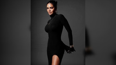 Esha Gupta's black stiletto pumps are from the luxury line, Christian Louboutin. (Instagram/@egupta)