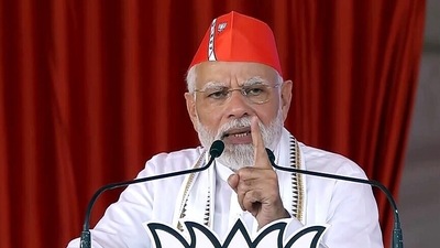 Prime Minister Narendra Modi addresses a public rally, at Jamkandorana, in Rajkot, Gujarat on Tuesday. (ANI) Prime Minister Narendra Modi addresses a public rally, at Jamkandorana, in Rajkot, Gujarat on Tuesday. (ANI)
