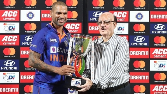 India captain Shikhar Dhawan receives the trophy from former BCCI president CK Khanna after 2-1 ODI series win against South Africa.(BCCI)
