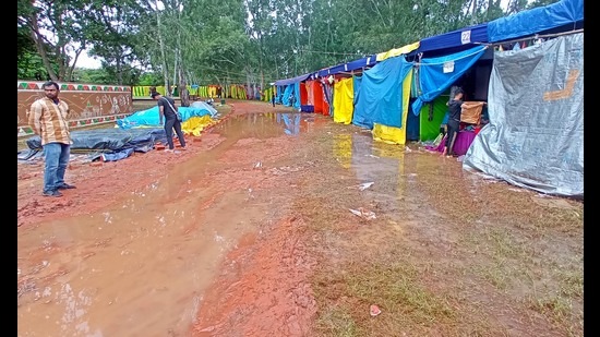 Vendors at the crafts mela in Chandigarh said their goods were damaged and they were unable to open their stalls, as there is no drainage system at the venue, which led to rainwater accumulation. (Sant Arora/HT)