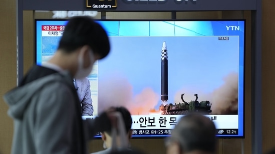 A TV screen showing a news programme reporting about North Korea's missile launch with file footage, is seen at the Seoul Railway Station in Seoul, South Korea,(AP)