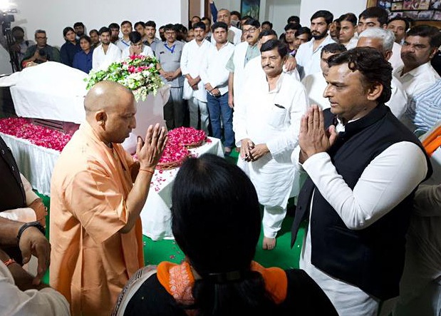 Uttar Pradesh CM Yogi Adityanath greets Samajwadi Party chief Akhilesh Yadav as he pays last respect to the mortal remains of former state chief minister Mulayam Singh Yadav at Saifai, in Etawah, on Monday. (ANI Photo) Uttar Pradesh CM Yogi Adityanath greets Samajwadi Party chief Akhilesh Yadav as he pays last respect to the mortal remains of former state chief minister Mulayam Singh Yadav at Saifai, in Etawah, on Monday. (ANI Photo)