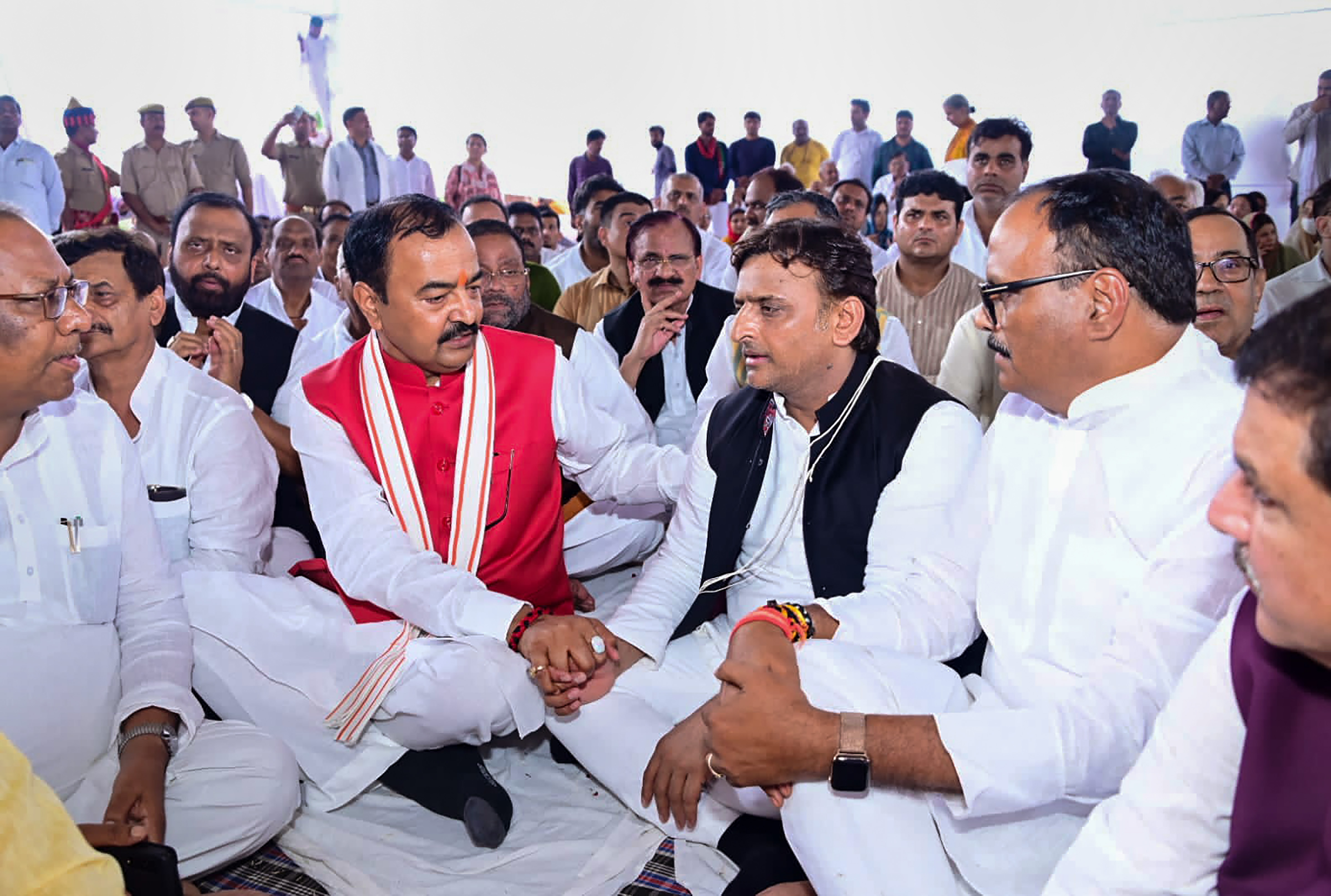 Uttar Pradesh deputy chief ministers Brajesh Pathak and Keshav Prasad Maurya offer condolences to Samajwadi Party president Akhilesh Yadav during the funeral of his father and party founder Mulayam Singh Yadav at Saifai, (PTI) Uttar Pradesh deputy chief ministers Brajesh Pathak and Keshav Prasad Maurya offer condolences to Samajwadi Party president Akhilesh Yadav during the funeral of his father and party founder Mulayam Singh Yadav at Saifai, (PTI)