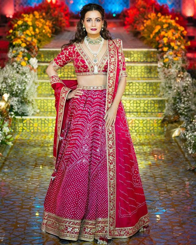 Dia Mirza Rekhi walks down the ramp in a red bandhani lehenga (Photo: Instagram)