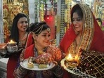 Married women observe Karwa Chauth celebrations at a temple in Chandigarh.&nbsp;