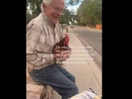The old man got his pet chicken for a toddler, The old man got his pet chicken for a toddler,