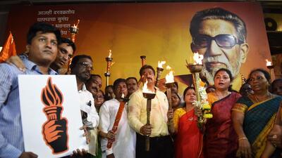 Mumbai, India, October 11: Shiv Sena (Uddhav Balasaheb Thackeray) party workers hold burning torches during a "Mashaal Rally", with the new name and symbol from Balasaheb Thackarey Memorial, Shivaji Park to Sena Bhavan, at Dadar, in Mumbai, India, on Tuesday, October 11, 2022. (Photo Rajesh Waradkar/HT Photo) (HT PHOTO) Mumbai, India, October 11: Shiv Sena (Uddhav Balasaheb Thackeray) party workers hold burning torches during a "Mashaal Rally", with the new name and symbol from Balasaheb Thackarey Memorial, Shivaji Park to Sena Bhavan, at Dadar, in Mumbai, India, on Tuesday, October 11, 2022. (Photo Rajesh Waradkar/HT Photo) (HT PHOTO)