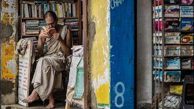 At a bookshop in Gaya. “The reading of fiction is the practice of a unique imaginative empathy that visual media cannot offer.” - Saikat Majumdar (Shutterstock) At a bookshop in Gaya. “The reading of fiction is the practice of a unique imaginative empathy that visual media cannot offer.” - Saikat Majumdar (Shutterstock)