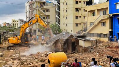 Bruhat Bengaluru Mahanagara Palike has a launched a drive to demolish illegal structures built over storm water drains and water bodies after a recent flooding in the city. (PTI) Bruhat Bengaluru Mahanagara Palike has a launched a drive to demolish illegal structures built over storm water drains and water bodies after a recent flooding in the city. (PTI)