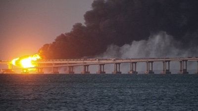 Russia-Ukraine War: Flame and smoke rise from the Crimean Bridge connecting Russian mainland and the Crimean peninsula. (AP)