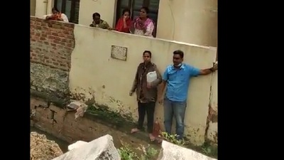 Screen grab from the viral Twitter video where the couple threatened to burn themselves down in Bengaluru Screen grab from the viral Twitter video where the couple threatened to burn themselves down in Bengaluru