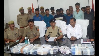 The arrested accused and their captured paraphernalia in Prayagraj on Wednesday (HT Photo) The arrested accused and their captured paraphernalia in Prayagraj on Wednesday (HT Photo)