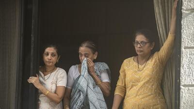 Mumbai, India - July 31, 2022: Family members of Shiv Sena MP Sanjay Raut wave their hands at him from the window while being taken to Enforcement Directorate (ED) office from his Maitri residence at Bhandup, in Mumbai, India, on Sunday, July 31, 2022. (Photo by Satish Bate/Hindustan Times) (Satish Bate/HT PHOTO) Mumbai, India - July 31, 2022: Family members of Shiv Sena MP Sanjay Raut wave their hands at him from the window while being taken to Enforcement Directorate (ED) office from his Maitri residence at Bhandup, in Mumbai, India, on Sunday, July 31, 2022. (Photo by Satish Bate/Hindustan Times) (Satish Bate/HT PHOTO)