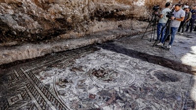 This picture shows a view of a mosaic floor dating to the Roman era being excavated in the city of al-Rastan in Syria's west-central province of Homs. (AFP) This picture shows a view of a mosaic floor dating to the Roman era being excavated in the city of al-Rastan in Syria's west-central province of Homs. (AFP)
