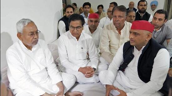 Bihar chief minister Nitish Kumar with Samajwadi Party national Akhilesh Yadav and others in Saifai on Wednesday. (ANI PHOTO)