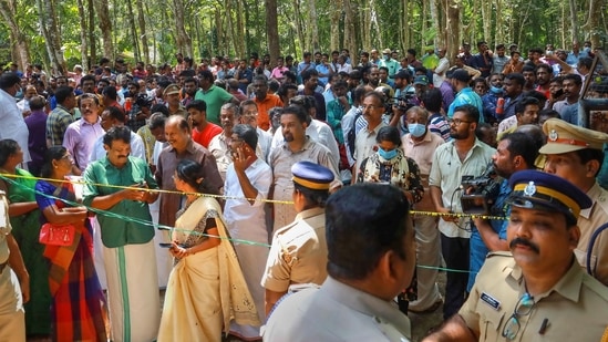 Police and locals at the place where two women were allegedly murdered and buried in Kerala's Pathanamthitta.(PTI)