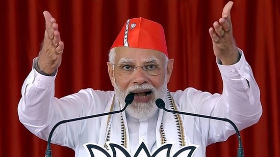 Prime Minister Narendra Modi addressing a rally in Rajkot on Tuesday. (ANI) Prime Minister Narendra Modi addressing a rally in Rajkot on Tuesday. (ANI)
