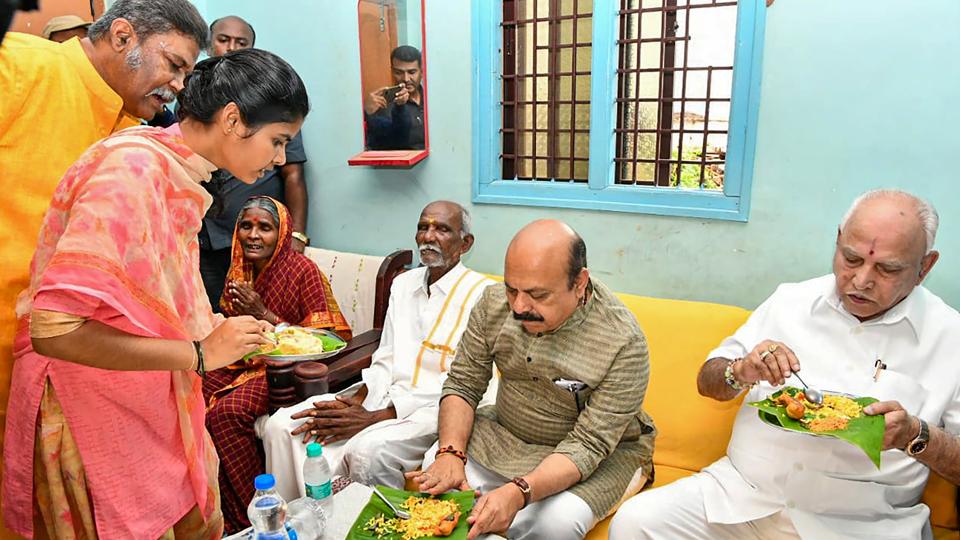 Chief minister Basavaraj Bommai had breakfast with Hirala Kollarappa, a Dalit community member, and his family members, at Kamalapura village in Vijayanagar district. (PTI)