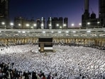 Muslim worshippers and pilgrims (white) pray around the Kaaba at the Grand Mosque in Saudi Arabia's holy city of Mecca.(AFP) Muslim worshippers and pilgrims (white) pray around the Kaaba at the Grand Mosque in Saudi Arabia's holy city of Mecca.(AFP)