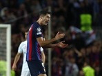 Barcelona's Robert Lewandowski celebrates after scoring his side's second goal during the Champions League Group C soccer match between Barcelona and Inter Milan at the Camp Nou stadium.