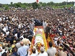 A huge crowd of Samajwadi Party workers and supporters during party founder Mulayam Singh Yadav’s funeral procession, in Saifai, Tuesday. (PTI Photo)