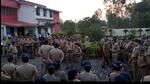 Police force assembled at Kunda police station on Thursday after the confrontation between UP police and US Nagar villagers on Wednesday evening.