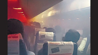 Smoke emanates from SpiceJet Q400 aircraft VT-SQB operating from Goa to Hyderabad. (ANI)