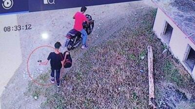 A CCTV visual shows the accused fleeing on a bike after firing bullets on the mining trader in Kashipur on Thursday. (Sourced) A CCTV visual shows the accused fleeing on a bike after firing bullets on the mining trader in Kashipur on Thursday. (Sourced)