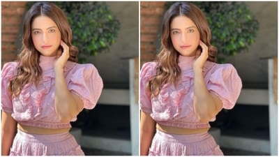 Aamna picked a pastel pink cropped top featuring closed neckline, puff half sleeves, and laved details at the neckline. She further teamed it with a pastel pink short skirt featuring pleat and frill details. The skirt also came with tier details. (Instagram/@aamnasharifofficial) Aamna picked a pastel pink cropped top featuring closed neckline, puff half sleeves, and laved details at the neckline. She further teamed it with a pastel pink short skirt featuring pleat and frill details. The skirt also came with tier details. (Instagram/@aamnasharifofficial)