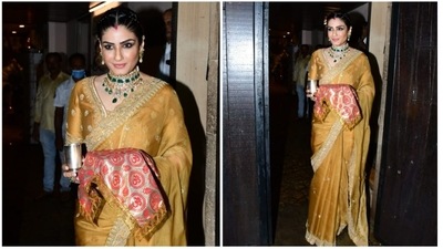 Raveena Tandon opted for a traditional yellow silk saree which she accessorised with green Kundan jewellery set. (HT Photo/Varinder Chawla) Raveena Tandon opted for a traditional yellow silk saree which she accessorised with green Kundan jewellery set. (HT Photo/Varinder Chawla)