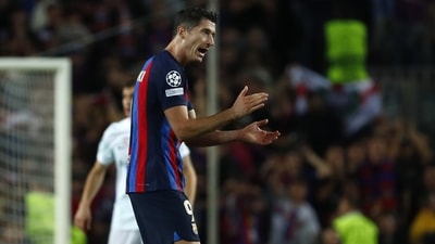 Barcelona's Robert Lewandowski celebrates after scoring his side's second goal during the Champions League Group C soccer match between Barcelona and Inter Milan at the Camp Nou stadium. (AP) Barcelona's Robert Lewandowski celebrates after scoring his side's second goal during the Champions League Group C soccer match between Barcelona and Inter Milan at the Camp Nou stadium. (AP)