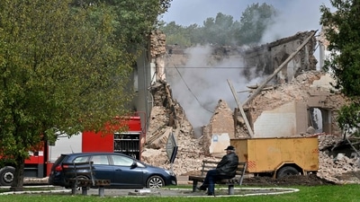 A local resident sits outside a building destroyed by Russian, Iranian-made, drones after an airstrike on Bila Tserkva, southwest of Kyiv, on October 5, 2022. (AFP / File) A local resident sits outside a building destroyed by Russian, Iranian-made, drones after an airstrike on Bila Tserkva, southwest of Kyiv, on October 5, 2022. (AFP / File)