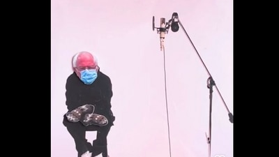 The image taken from the viral video shows a meme that the artist created using a cutout. (Twitter/@RudyWillingham)