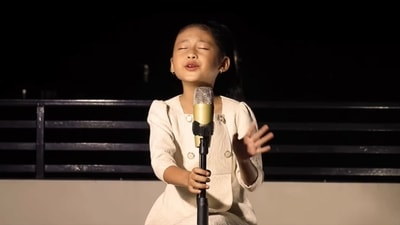 The image shows the little girl singing 'Tujhse Naraz Nahin Zindagi' from the 1983 film Masoom. Her video was shared on Twitter by Shekhar Kapur. (YouTube/Elizabeth Ramhlunmawi) The image shows the little girl singing 'Tujhse Naraz Nahin Zindagi' from the 1983 film Masoom. Her video was shared on Twitter by Shekhar Kapur. (YouTube/Elizabeth Ramhlunmawi)