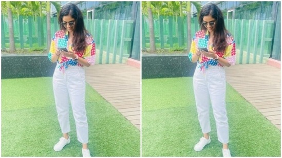Keerthy teamed her shirt with a pair of high-waisted white trousers and white sneakers.(Instagram/@keerthysureshofficial)