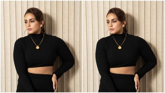 Huma looked every bit stunning in a black cropped top with full sleeves and turtle neck details. She further teamed it with a black high-waisted pencil skirt.(Instagram/@iamhumaq)