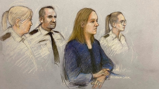This court artist sketch by Elizabeth Cook shows Lucy Letby appearing in the dock at Manchester Crown Court, in Manchester, England.