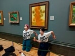 Image posted by the ‘Just Stop Oil’ group on Twitter after throwing soup over Van Gogh's “Sunflowers Image posted by the ‘Just Stop Oil’ group on Twitter after throwing soup over Van Gogh's “Sunflowers
